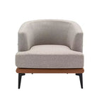 Fauteuil rond capitonné bicolore moderne avec accoudoirs cylindriques, en cuir PU et pieds en métal