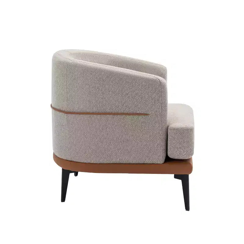 Fauteuil rond capitonné bicolore moderne avec accoudoirs cylindriques, en cuir PU et pieds en métal