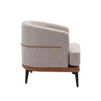 Fauteuil rond capitonné bicolore moderne avec accoudoirs cylindriques, en cuir PU et pieds en métal