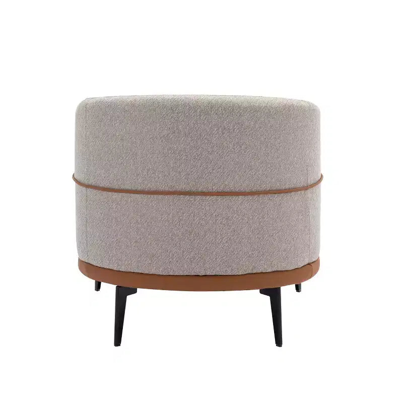 Fauteuil rond capitonné bicolore moderne avec accoudoirs cylindriques, en cuir PU et pieds en métal