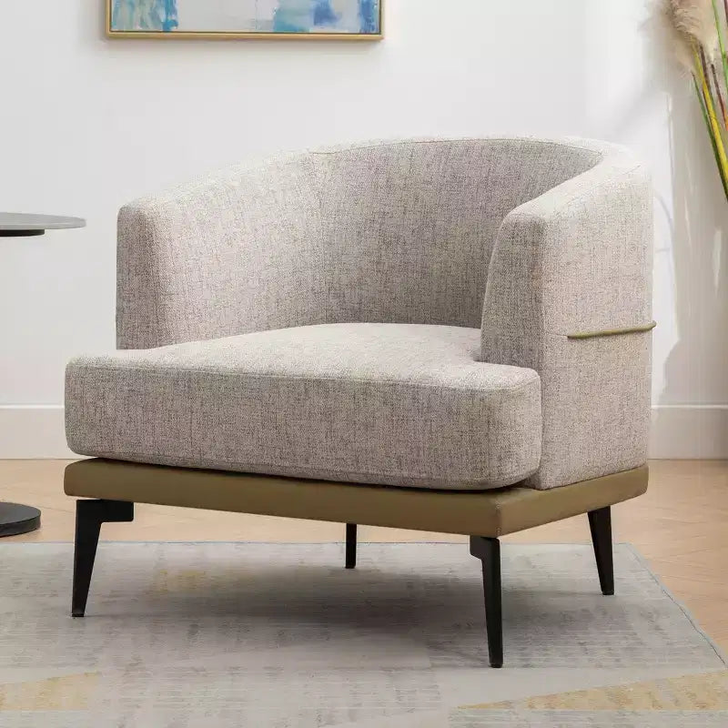 Fauteuil rond capitonné bicolore moderne avec accoudoirs cylindriques, en cuir PU et pieds en métal